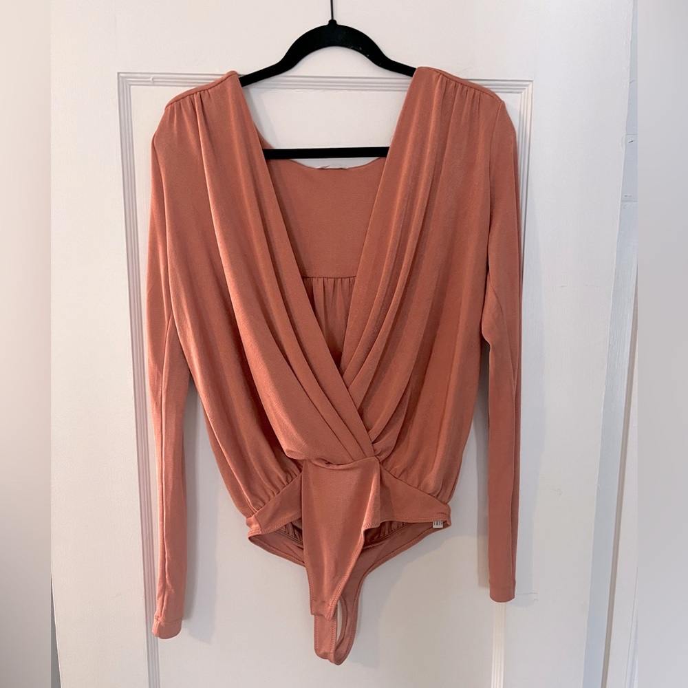 Free People burnt orange V-neck bodysuit
